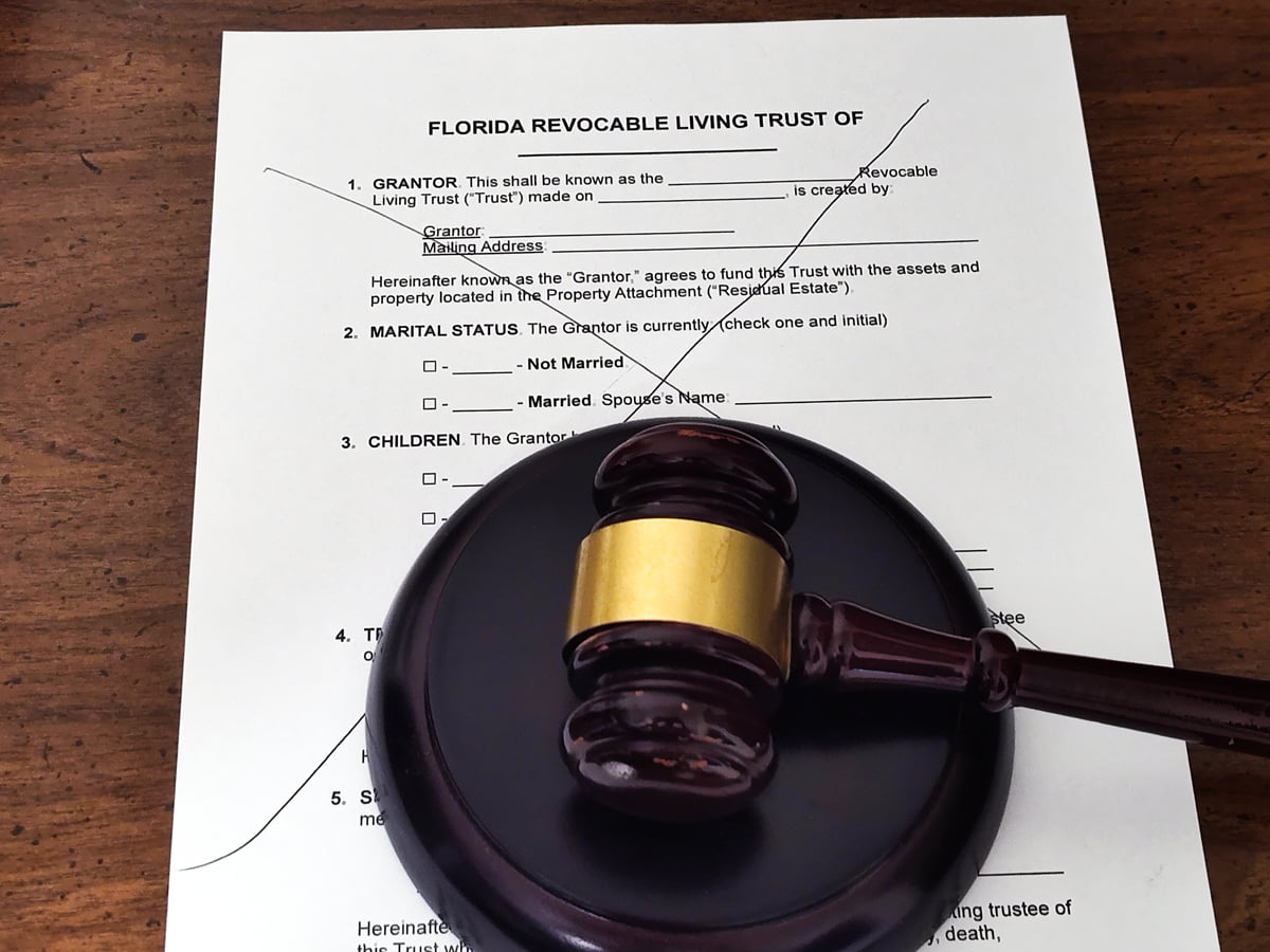 Florida revocable living trust document with judge’s gavel symbolizing trust litigation dispute