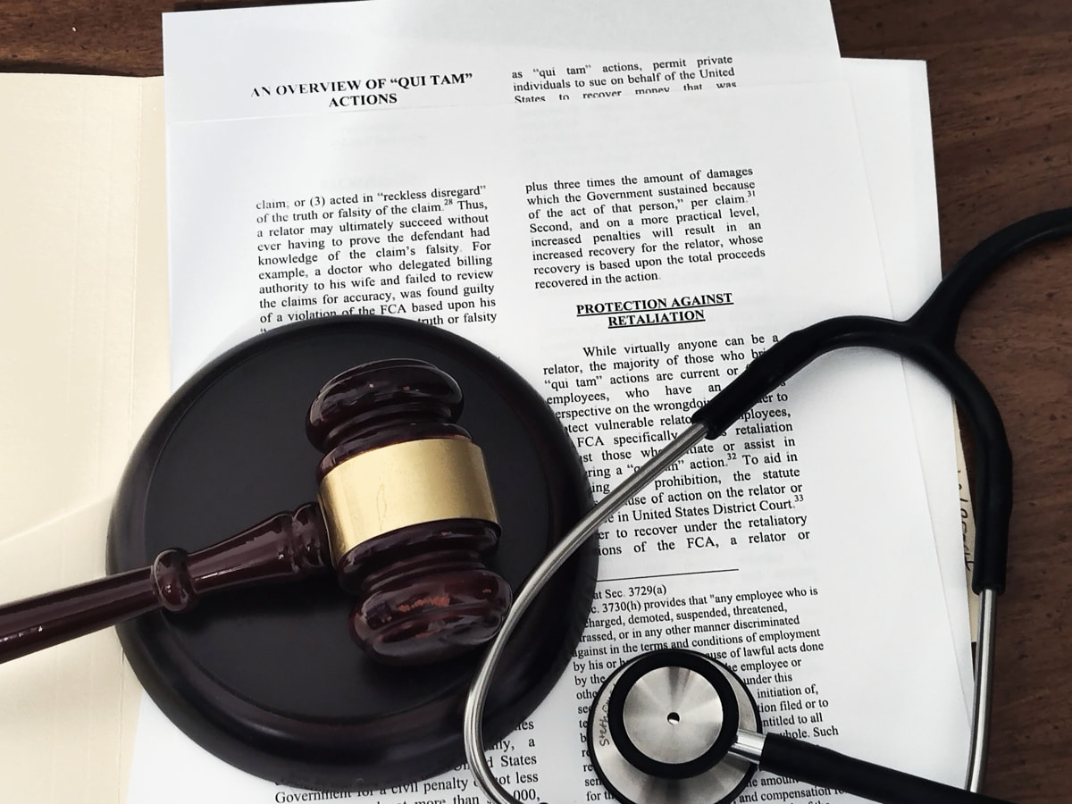 Gavel and stethoscope resting on legal documents titled “An Overview of Qui Tam Actions”